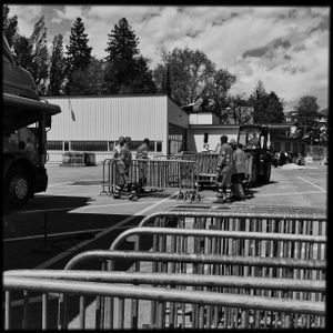 Roadway workers storing the grids