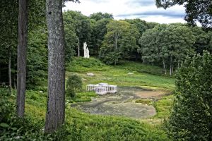 The Pavilion in the Pond with Monument to Lincoln Kirstein