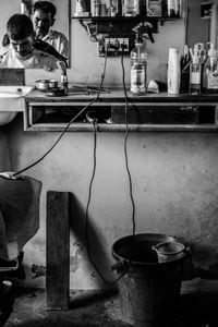 The Barber - Wires going all over the place as one of the customers gets a buzz trim.