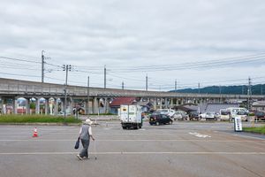 ‘Reclaimed by Nature or Man’, concrete railway bridge structure that runs through the jumbled messy town of Satoyama.