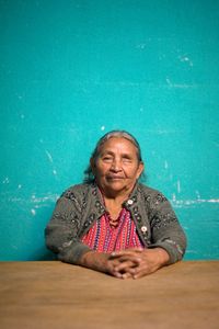 Juana Buch Chumil sees with only one eye as she didn't have money to save her left eye when it started to lose light. Juana lives with her daughter and two grandchildren. The bed she shares with grandchildren has no mattress. The poorly constructed roof made of lamina leeks water and it turns dirt floors to mud when it rains. Juana experiences vomit and dizziness regularly. Though, she is the onl