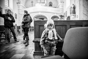 At the church, the youngest visitor.