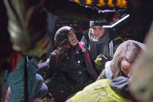 Minutes after landing on the shores of Lesbos, a Syrian woman cries out as medics try to revive a family member, later pronounced dead. Lesbos, March 20, 2016.