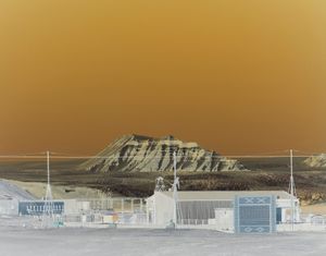 The harbour in the coal mining ghost town Pyramiden, with the Nordenskiold Glacier in the background.