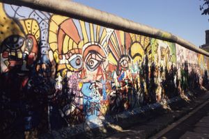 Bright masks Berlin Wall