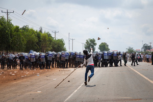 Demonstrators and police clash in front of Sabrina Factory. Workers had been on strike since May 25, 2013 demanding a US$5/month salary increase. June 03, 2013
