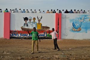 Children play around the stadium, 2