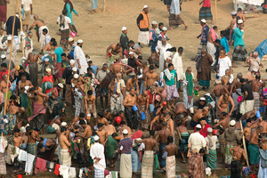 Devotees taking shower in the morning at Camp