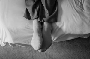 He can spend a long time resting on the bed in the care home after taking some of the medication that he needs.