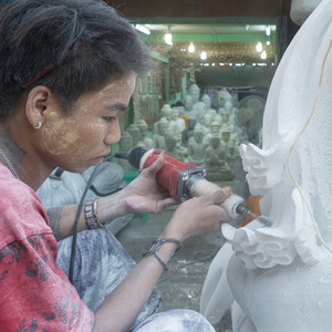 Child labourer at workshop in Mandalay, Myanmar.