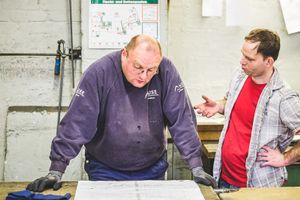 In the metal workshop.