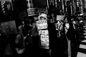 People take part of a demonstration against the US base in Henoko (Okinawa) in Shinjuku