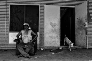 Christmas morning in One Mile Community, a large community of poverty and dysfunction