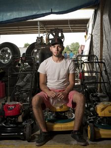 Mike Omerovic is Bosnian and works in his father's small engine repair business, Tony's Tools. They have a space in the Pendergrass Flea Market in Pendergrass, GA in addition to a shop in Lawrenceville, GA. Mike is a senior in high school and wants to open his own repair shop as soon as he graduates, but he hasn't decided whether to do it in Bosnia or the US. © Forest McMullin