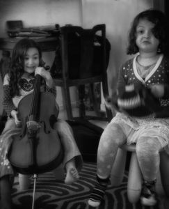 Afternoon Duet: An afternoon play date with a good friend turns into a series of duets and trios with intermissions of giggling.  © Frank Welte