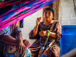 Some families have exchanged traditional building materials for concrete. Traditionally, the walls are made out of yotojoro — a wattle and daub of mud, hay and dried canes, but today some Wayuu have shifted towards a more modern construction style, using cement and other materials.