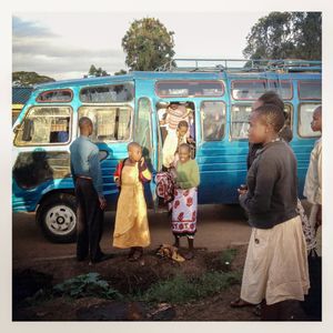 A school bus drops pupils back at their homes in Kibera. The Kibera slum is the largest slum in Nairobi with around half a million inhabitants.