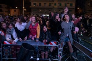 A group of young fans during the concert for the Epiphany at Piazza Mercato, Naples.