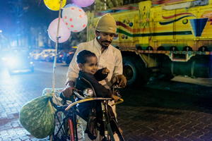 Father and son in the Mumbai nigh.