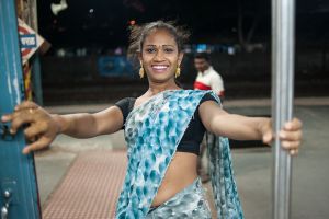a young hijra who I met on a train in Mumbai - She was dancing and hoping to bless passengers, in exchange for a few rupees.  © Alison McCauley
