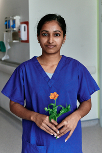 Swara Sandhya, Staff Nurse with Calendula officinalis