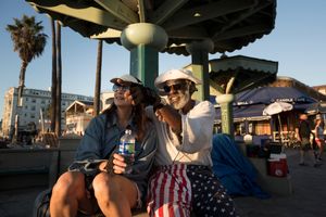 Venice beach Boardwalk, homeless people and artists.