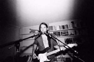 Alessandro, voice and guitar.