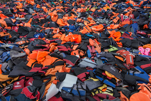 Thousands of life jackets used by refugees during their crossing from Turkey to the Greek shores pile at a dump in Lesvos. March 13, 2016, Lesvos, Greece