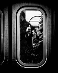 Woman Applying Makeup Inside A Subway Train, Manhattan, NYC