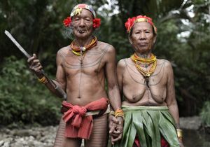 Portrait of fierce Mentawai tribe husband and wife