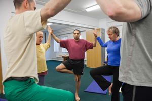 Prisoners and staff take part in a Yoga class run by the Prison Phoenix Trust. HMP Bullingdon, Oxfordshire.