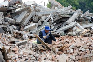 scavenging the demolition debris for bricks