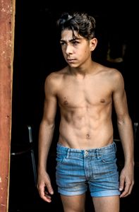 El Puche, Almeria, Spain. Teenage Roma boy.