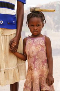 Hope: Age 4 & her mother A. Faith: Age 19 .Working in Quarry for 10 Years.