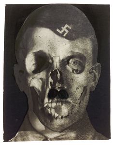 Erwin Blumenfeld, Grauenfresse / Hitler, Holland, 1933. Collage and ink on photomon- tage (gelatin silver print, double-exposition). Printed later. Collection Helaine and Yorick Blumenfeld, Courtesy of Modernism Inc., San Francisco © The Estate of Erwin Blumenfeld