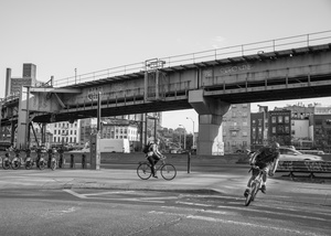 Bicycle commuters getting on and off the Williamsburg bridge