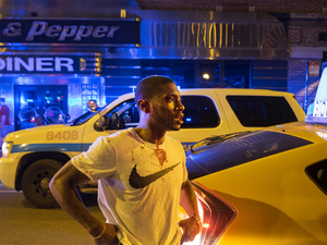 USA. Chicago. 2015. Portrait of a guy on the 4th of July celebration.