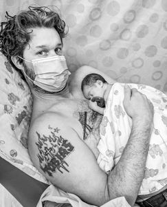 Dad and newborn in NeoNatal Intensive Care Unit in the midst of the Covid Pandemic