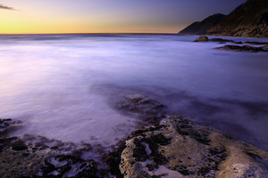 Still / One more sunset at Noordhoek beach, on the Atlantic Ocean along the Cape Peninsula, south of Cape Town, South Africa.