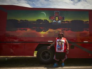 Bus driver bringing the  Gauchito Gil devotees to Mercedes town for  the celebrations of January 8, anniversary of the murder of the popular saint