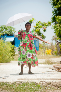 Janis Kalo, 58 years, Tasariki Village, Moso Island. Standing where her Women's Association used to meet.