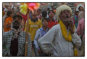 Awestruck folks at a country fair.
