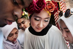 Dian Pelangi with her assistants during the campaign photo shoot for her new line inspired by Frida Kahlo.
