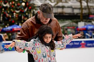 and a grandfather teaching his granddaughter.
