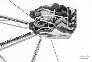 Couple enjoying a fare ride, Alexandra Palace, London