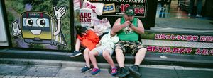 Tokyo heatwave. Tourists shop and collapse