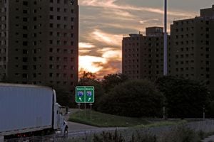 From 1958 - 1968, thousands of black Detroiters were uprooted from their homes only to face discrimination while searching for new homes. The Brewster-Douglas Housing Projects pictured in the background became home to many of the displaced people. Shortly after freeway construction ended, the 1967 Detroit race riots left 43 dead, 467 injured and more than $50 million in damages.© Nicholas Gregory