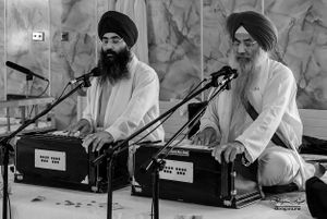 Singing devotional songs in a gurudwara, Birmingham