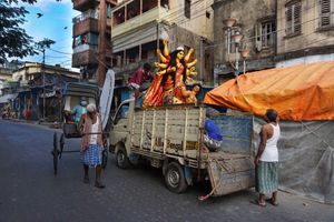 The idol heading towards the Puja Pandal.