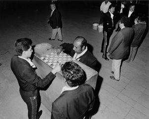 Mariachi band playing checkers
